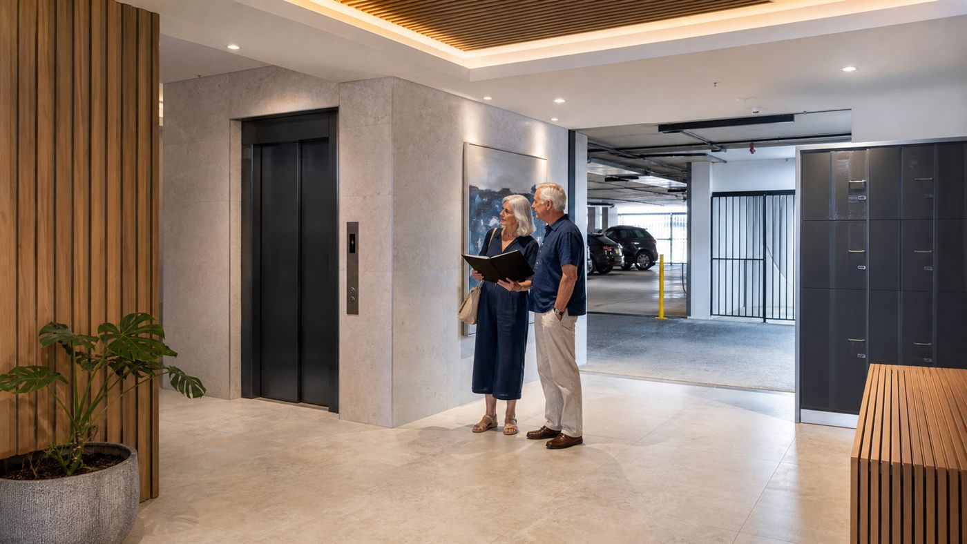 Buyers checking the shared areas inside a modern Gold Coast apartment building