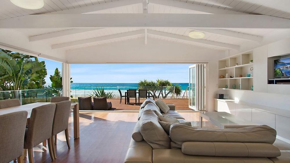 Gold Coast couple splash millions on beach shack they plan to knock down